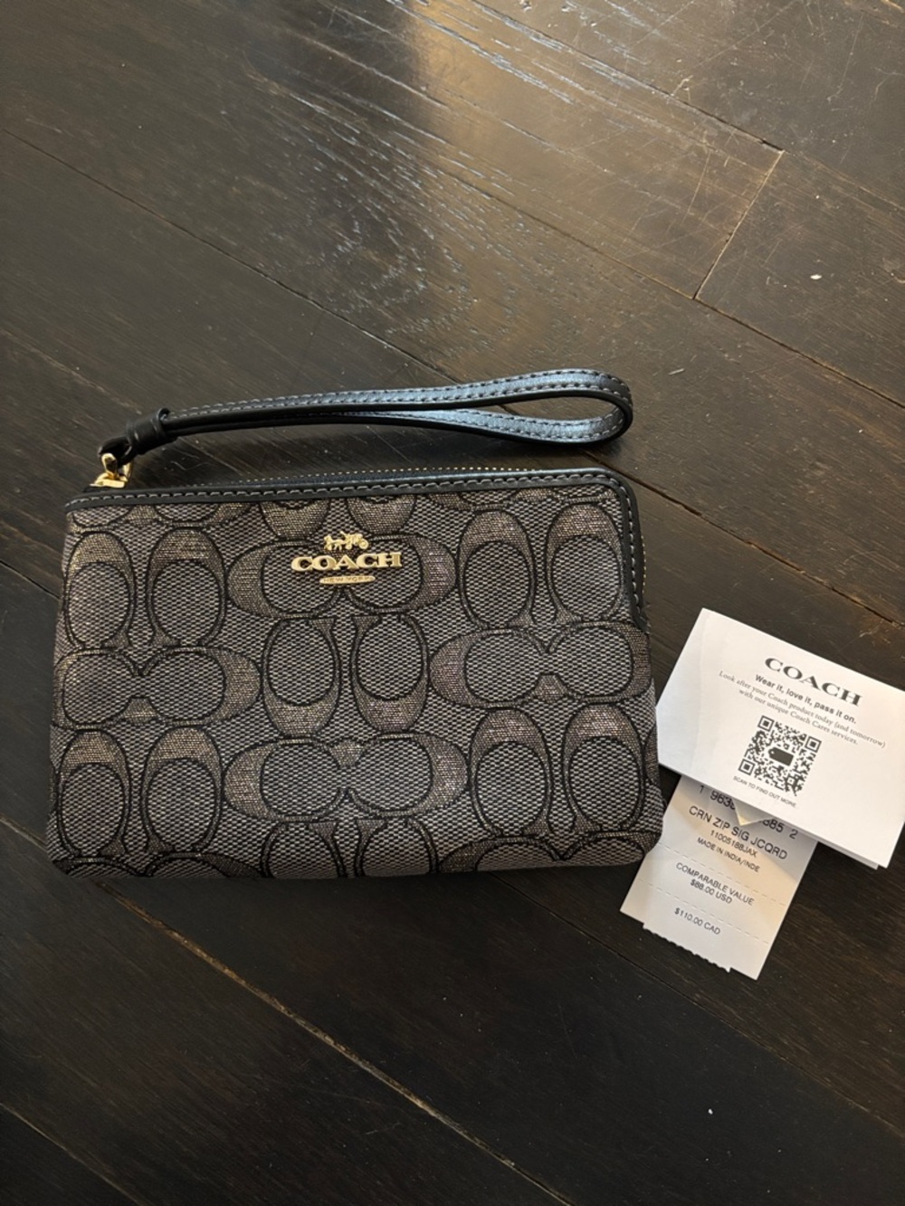 COACH Black Signature Canvas Wristlet with Gold Logo